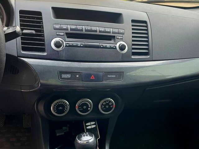 Чорний Міцубісі Lancer, об'ємом двигуна 2 л та пробігом 255 тис. км за 7200 $, фото 7 на Automoto.ua