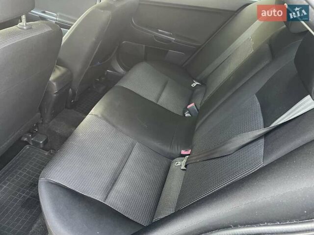Чорний Міцубісі Lancer, об'ємом двигуна 1.5 л та пробігом 184 тис. км за 6000 $, фото 13 на Automoto.ua