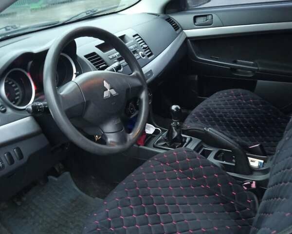 Черный Мицубиси Лансер, объемом двигателя 1.5 л и пробегом 177 тыс. км за 5100 $, фото 10 на Automoto.ua