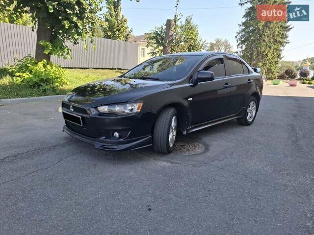 Черный Мицубиси Лансер, объемом двигателя 2 л и пробегом 230 тыс. км за 7000 $, фото 23 на Automoto.ua
