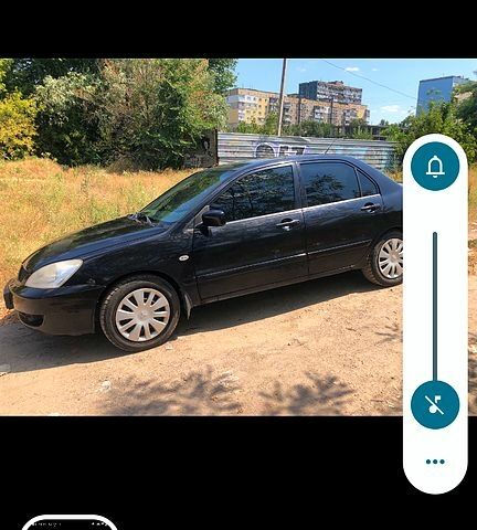 Чорний Міцубісі Lancer, об'ємом двигуна 1.6 л та пробігом 245 тис. км за 3200 $, фото 1 на Automoto.ua