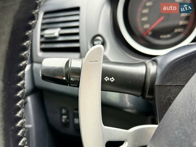 Чорний Міцубісі Lancer, об'ємом двигуна 2 л та пробігом 118 тис. км за 6200 $, фото 18 на Automoto.ua