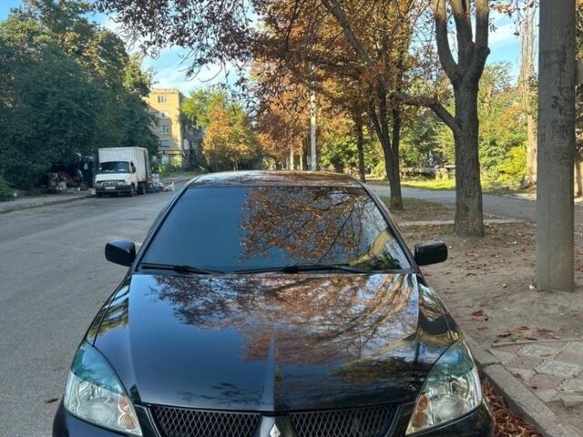 Міцубісі Lancer 2008 у Кривому Розі на Automoto.ua Чорний Міцубісі Lancer, об'ємом двигуна 1.6 л та пробігом 230 тис. км за 4380 $, фото 5 на Automoto.ua
