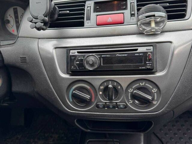 Чорний Міцубісі Lancer, об'ємом двигуна 1.6 л та пробігом 245 тис. км за 4500 $, фото 23 на Automoto.ua