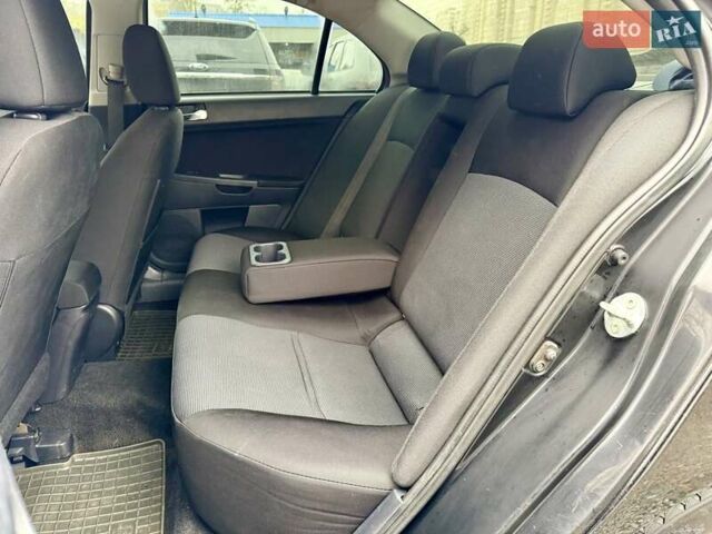 Чорний Міцубісі Lancer, об'ємом двигуна 2 л та пробігом 118 тис. км за 6200 $, фото 8 на Automoto.ua