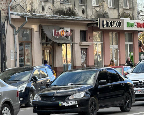 Черный Мицубиси Лансер, объемом двигателя 1.58 л и пробегом 220 тыс. км за 6599 $, фото 16 на Automoto.ua