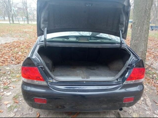 Черный Мицубиси Лансер, объемом двигателя 6 л и пробегом 190 тыс. км за 4500 $, фото 6 на Automoto.ua