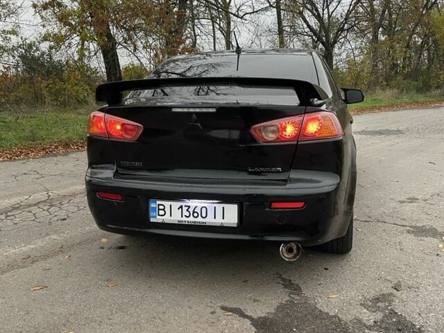 Чорний Міцубісі Lancer, об'ємом двигуна 2 л та пробігом 400 тис. км за 4396 $, фото 7 на Automoto.ua