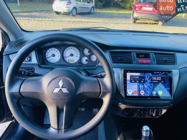 Мицубиси Лансер 2008 в Львове на Automoto.ua Черный Мицубиси Лансер, объемом двигателя 1.58 л и пробегом 200 тыс. км за 5200 $, фото 21 на Automoto.ua