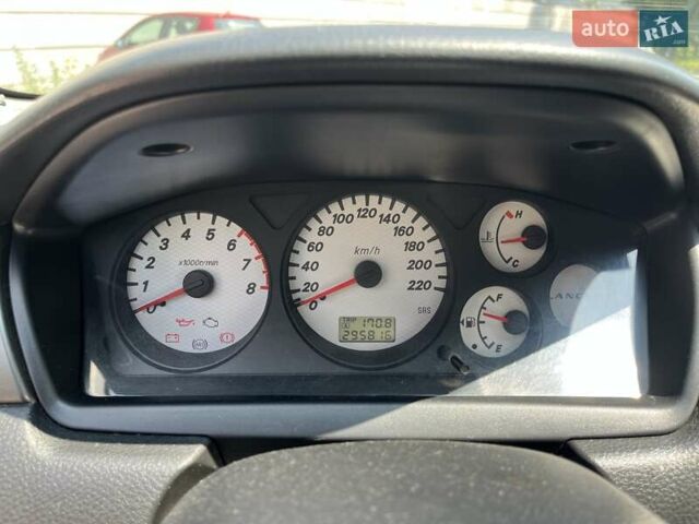 Чорний Міцубісі Lancer, об'ємом двигуна 1.6 л та пробігом 296 тис. км за 4200 $, фото 36 на Automoto.ua