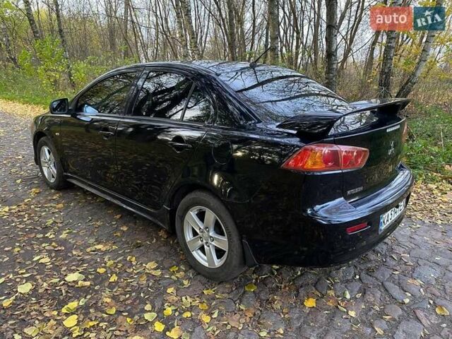 Чорний Міцубісі Lancer, об'ємом двигуна 2 л та пробігом 237 тис. км за 7500 $, фото 8 на Automoto.ua