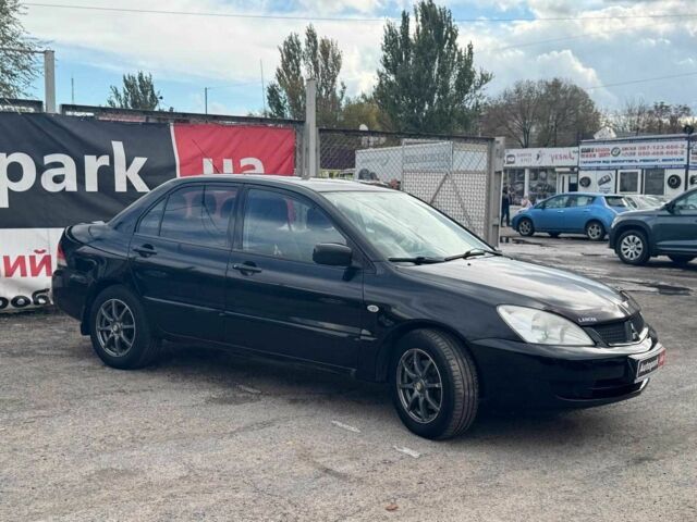 Мицубиси Лансер 2008 в Запорожье на Automoto.ua Черный Мицубиси Лансер, объемом двигателя 1.6 л и пробегом 316 тыс. км за 4290 $, фото 7 на Automoto.ua