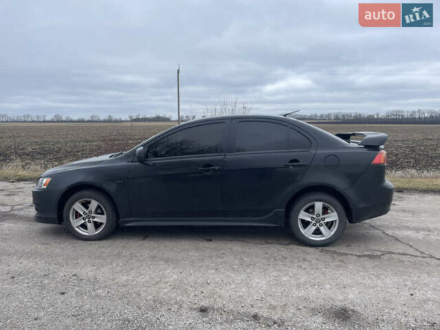 Чорний Міцубісі Lancer, об'ємом двигуна 2 л та пробігом 280 тис. км за 4400 $, фото 3 на Automoto.ua