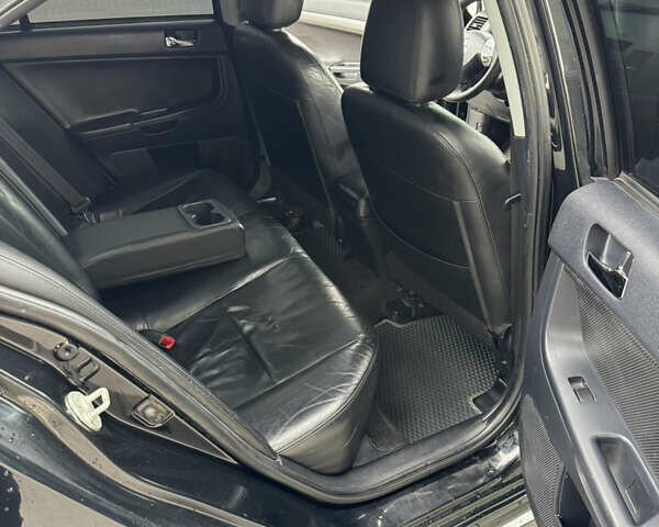 Чорний Міцубісі Lancer, об'ємом двигуна 2 л та пробігом 200 тис. км за 6800 $, фото 5 на Automoto.ua