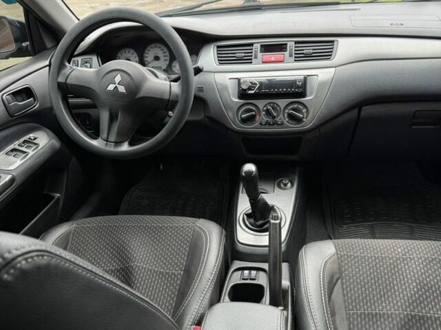 Чорний Міцубісі Lancer, об'ємом двигуна 1.6 л та пробігом 220 тис. км за 3600 $, фото 11 на Automoto.ua