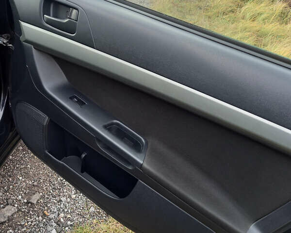 Чорний Міцубісі Lancer, об'ємом двигуна 1.5 л та пробігом 160 тис. км за 5850 $, фото 19 на Automoto.ua