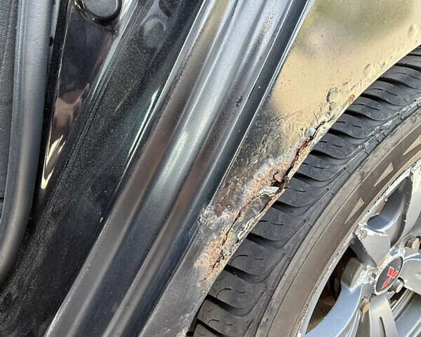 Черный Мицубиси Лансер, объемом двигателя 1.6 л и пробегом 321 тыс. км за 5000 $, фото 37 на Automoto.ua