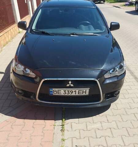 Чорний Міцубісі Lancer, об'ємом двигуна 2 л та пробігом 257 тис. км за 5500 $, фото 2 на Automoto.ua