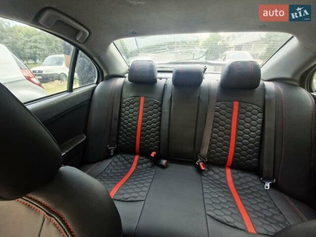 Чорний Міцубісі Lancer, об'ємом двигуна 2 л та пробігом 240 тис. км за 7850 $, фото 33 на Automoto.ua