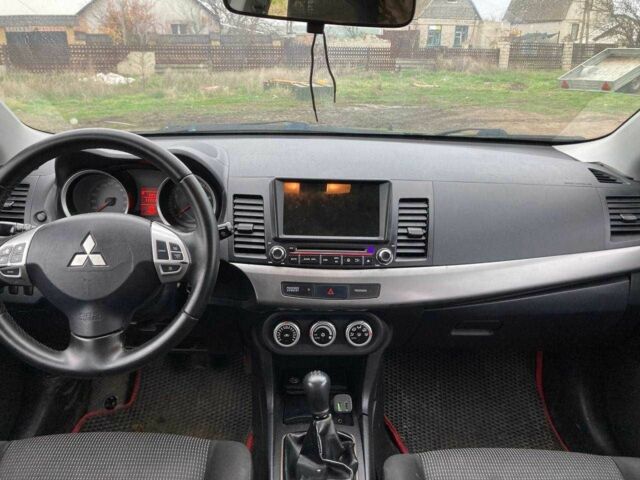 Чорний Міцубісі Lancer, об'ємом двигуна 2 л та пробігом 180 тис. км за 7500 $, фото 5 на Automoto.ua