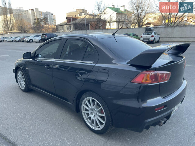 Чорний Міцубісі Lancer, об'ємом двигуна 2 л та пробігом 39 тис. км за 29500 $, фото 2 на Automoto.ua