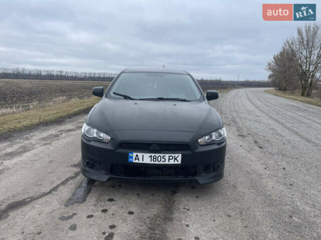 Чорний Міцубісі Lancer, об'ємом двигуна 2 л та пробігом 280 тис. км за 4400 $, фото 1 на Automoto.ua