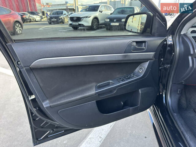 Чорний Міцубісі Lancer, об'ємом двигуна 2 л та пробігом 290 тис. км за 5900 $, фото 19 на Automoto.ua
