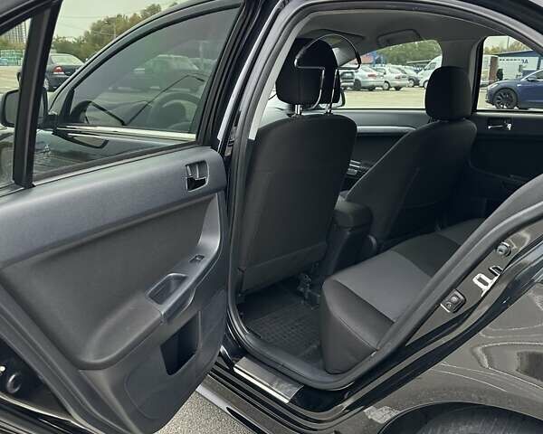 Чорний Міцубісі Lancer, об'ємом двигуна 2 л та пробігом 199 тис. км за 7900 $, фото 31 на Automoto.ua