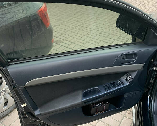 Чорний Міцубісі Lancer, об'ємом двигуна 2 л та пробігом 290 тис. км за 6500 $, фото 7 на Automoto.ua