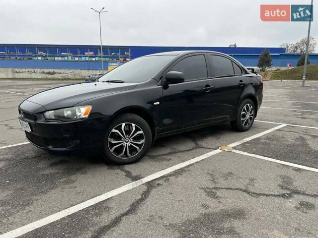 Черный Мицубиси Лансер, объемом двигателя 1.5 л и пробегом 225 тыс. км за 5100 $, фото 14 на Automoto.ua