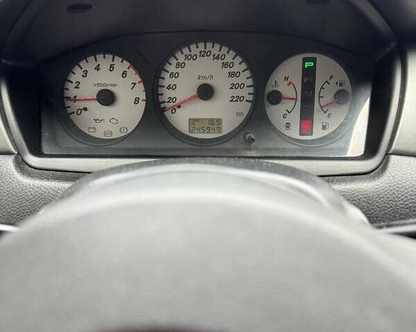 Чорний Міцубісі Lancer, об'ємом двигуна 1.6 л та пробігом 245 тис. км за 4500 $, фото 24 на Automoto.ua