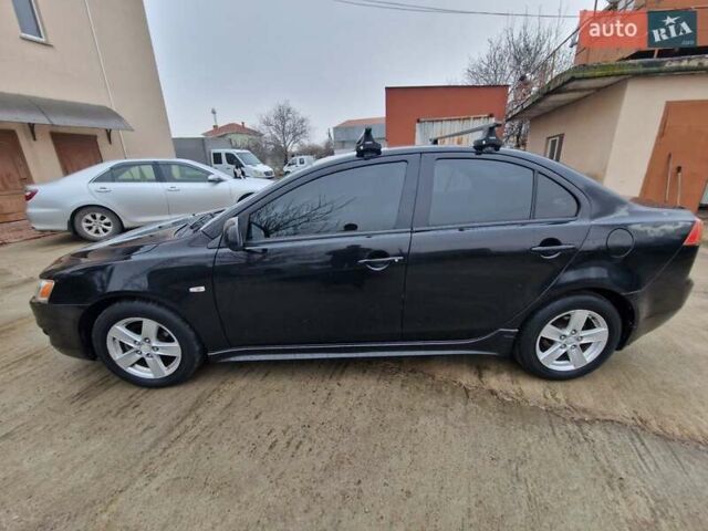 Чорний Міцубісі Lancer, об'ємом двигуна 2 л та пробігом 300 тис. км за 6000 $, фото 1 на Automoto.ua