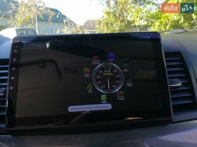 Мицубиси Лансер 2008 в Киеве на Automoto.ua Черный Мицубиси Лансер, объемом двигателя 2 л и пробегом 196 тыс. км за 5500 $, фото 15 на Automoto.ua