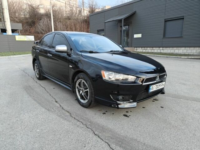 Черный Мицубиси Лансер, объемом двигателя 2 л и пробегом 245 тыс. км за 5600 $, фото 7 на Automoto.ua