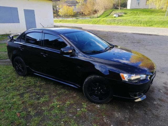 Міцубісі Lancer 2008 у Києві на Automoto.ua Чорний Міцубісі Lancer, об'ємом двигуна 2 л та пробігом 196 тис. км за 5500 $, фото 4 на Automoto.ua