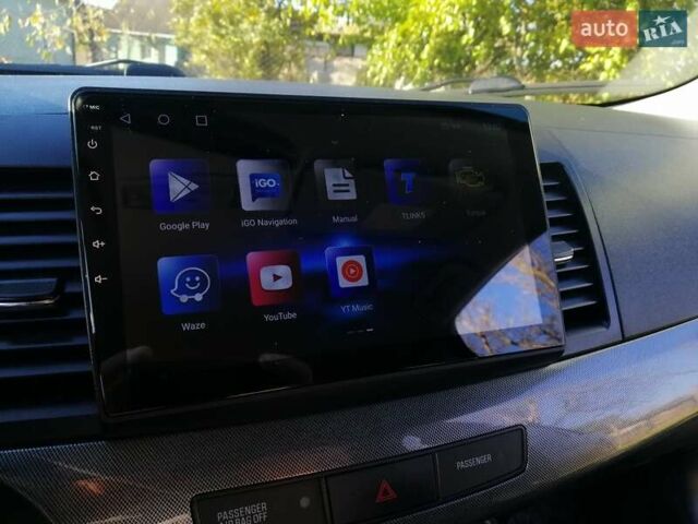 Мицубиси Лансер 2008 в Киеве на Automoto.ua Черный Мицубиси Лансер, объемом двигателя 2 л и пробегом 196 тыс. км за 5500 $, фото 14 на Automoto.ua