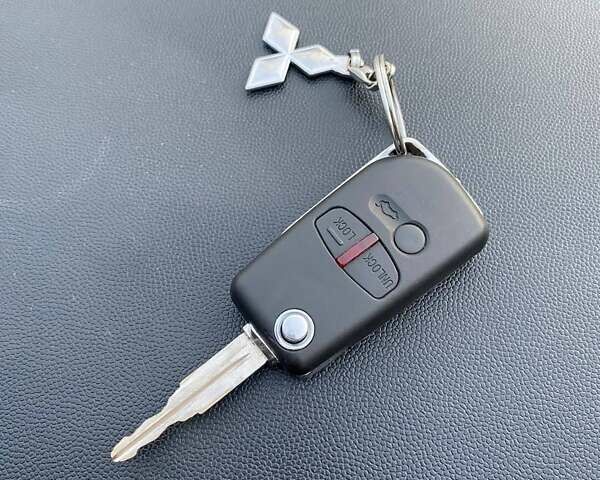 Чорний Міцубісі Lancer, об'ємом двигуна 2 л та пробігом 237 тис. км за 7500 $, фото 2 на Automoto.ua