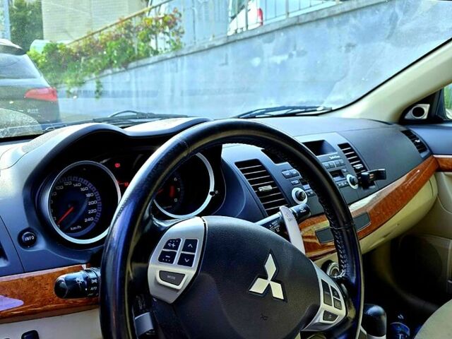 Чорний Міцубісі Lancer, об'ємом двигуна 2 л та пробігом 300 тис. км за 6600 $, фото 1 на Automoto.ua