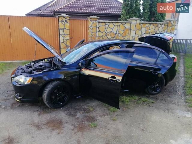 Мицубиси Лансер 2008 в Киеве на Automoto.ua Черный Мицубиси Лансер, объемом двигателя 2 л и пробегом 196 тыс. км за 5500 $, фото 32 на Automoto.ua