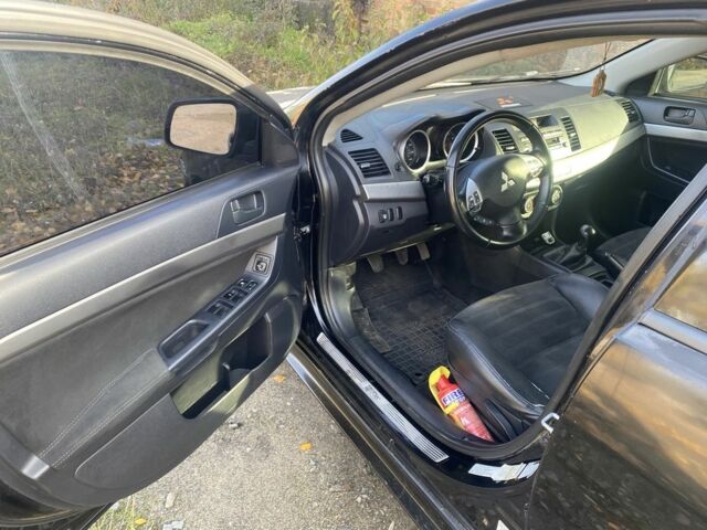 Черный Мицубиси Лансер, объемом двигателя 2 л и пробегом 190 тыс. км за 3100 $, фото 3 на Automoto.ua