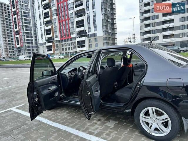 Чорний Міцубісі Lancer, об'ємом двигуна 1.6 л та пробігом 300 тис. км за 5500 $, фото 3 на Automoto.ua