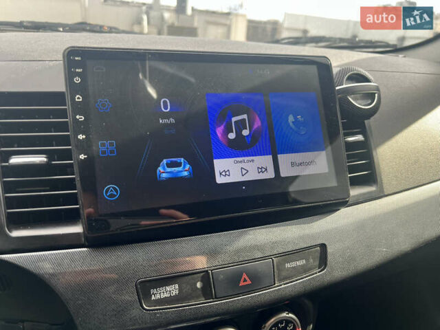 Мицубиси Лансер 2008 в Киеве на Automoto.ua Черный Мицубиси Лансер, объемом двигателя 2 л и пробегом 219 тыс. км за 6500 $, фото 10 на Automoto.ua