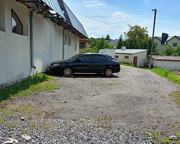 Мицубиси Лансер 2008 в Львове на Automoto.ua Черный Мицубиси Лансер, объемом двигателя 1.58 л и пробегом 200 тыс. км за 5200 $, фото 133 на Automoto.ua