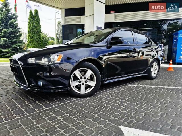 Чорний Міцубісі Lancer, об'ємом двигуна 2 л та пробігом 240 тис. км за 7850 $, фото 12 на Automoto.ua
