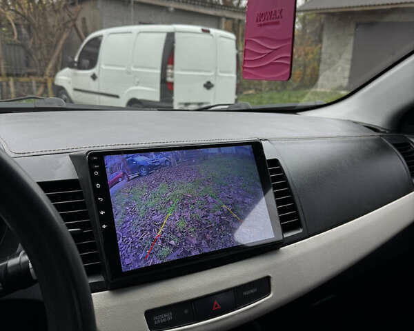 Черный Мицубиси Лансер, объемом двигателя 1.5 л и пробегом 278 тыс. км за 4200 $, фото 13 на Automoto.ua