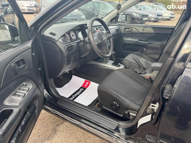 Мицубиси Лансер 2008 в Запорожье на Automoto.ua Черный Мицубиси Лансер, объемом двигателя 1.6 л и пробегом 316 тыс. км за 4290 $, фото 10 на Automoto.ua