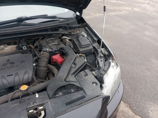 Чорний Міцубісі Lancer, об'ємом двигуна 2 л та пробігом 232 тис. км за 5000 $, фото 4 на Automoto.ua