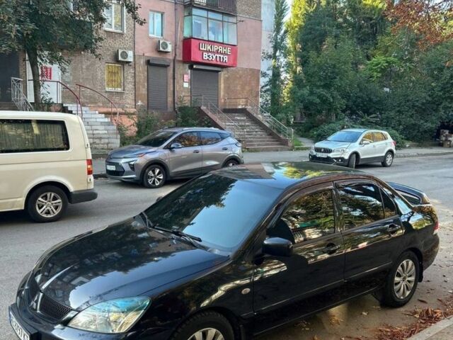 Міцубісі Lancer 2008 у Кривому Розі на Automoto.ua Чорний Міцубісі Lancer, об'ємом двигуна 1.6 л та пробігом 230 тис. км за 4380 $, фото 3 на Automoto.ua