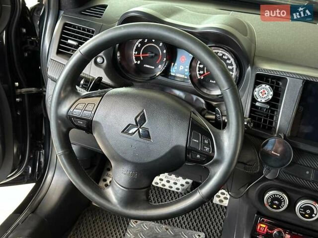 Чорний Міцубісі Lancer, об'ємом двигуна 2 л та пробігом 313 тис. км за 7690 $, фото 20 на Automoto.ua