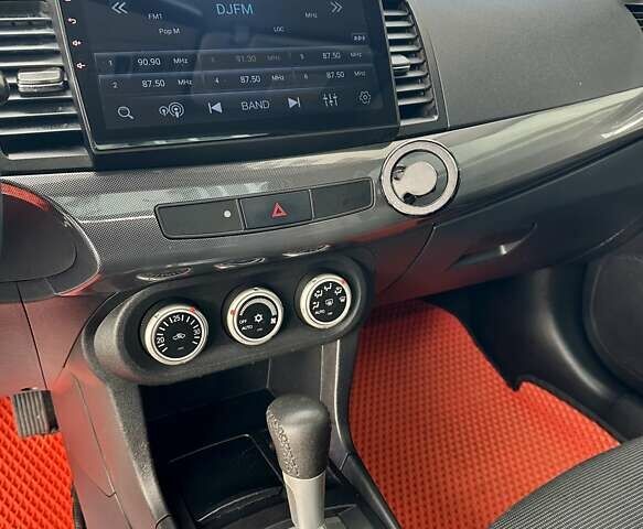 Черный Мицубиси Лансер, объемом двигателя 2 л и пробегом 150 тыс. км за 7850 $, фото 42 на Automoto.ua